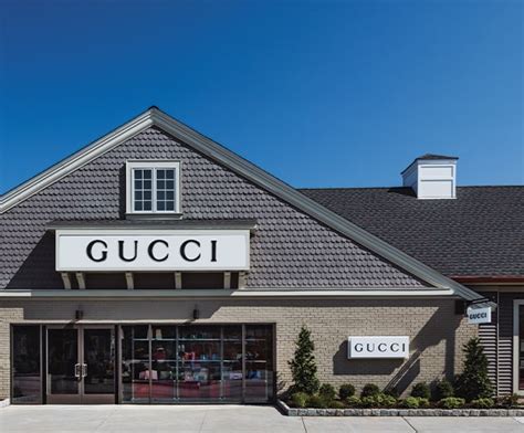 gucci woodbury common premium outlets.